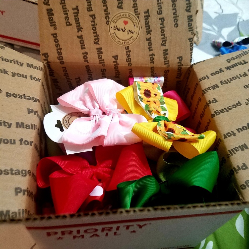 20 Handmade hair bows mystery box.